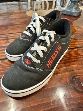 Heelys Black Skate Shoes with White Laces and Red Accents